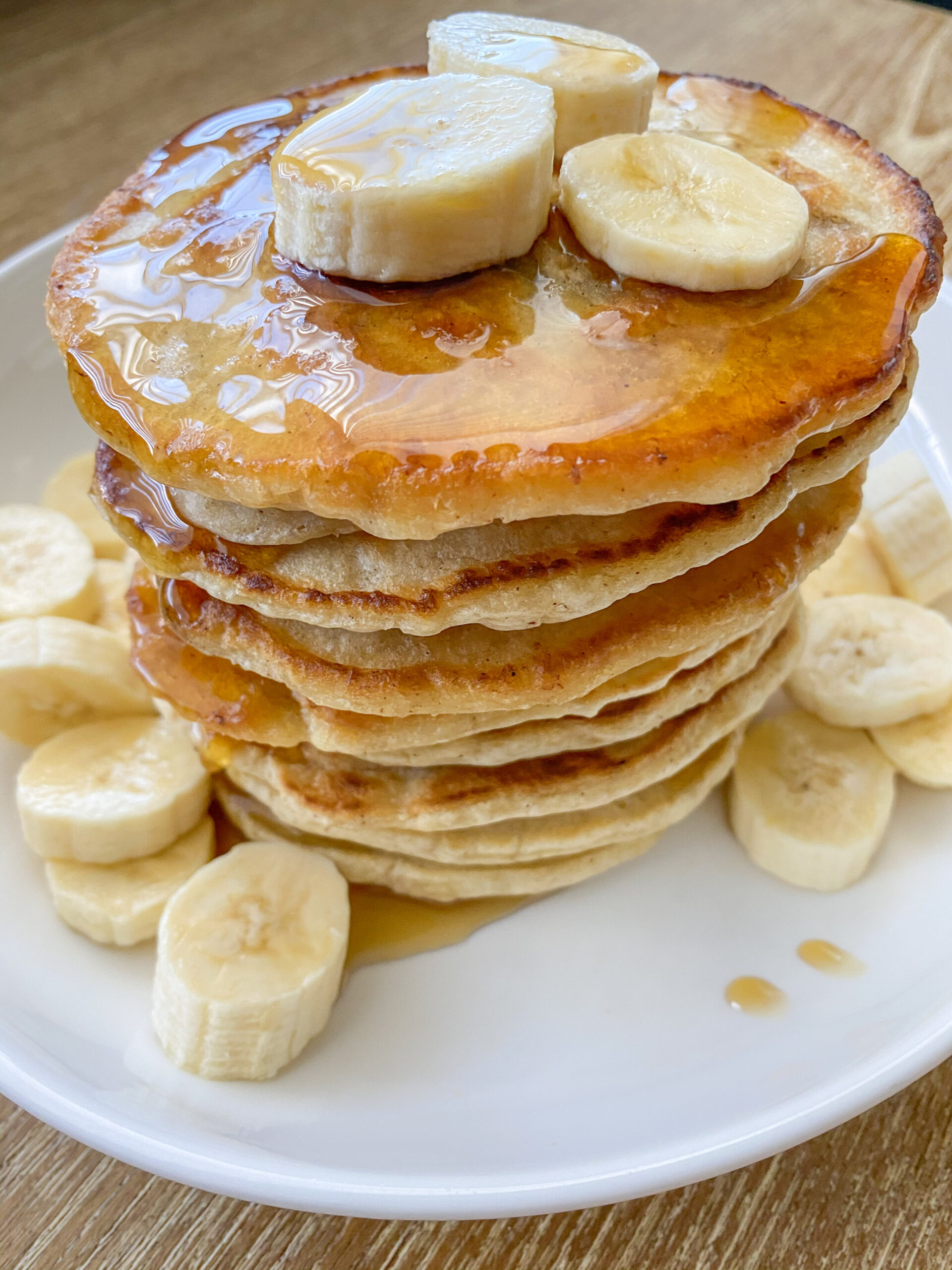 The Best Vegan Banana Pancakes: This banana pancakes recipe will quickly become a regular breakfast in your home. You only need 5 ingredients and about 20 minutes to make. Serve this delicious plant-based stack topped with banana slices and drizzled with maple syrup.

These vegan banana pancakes are so simple and delicious, and can be made gluten-free if needed.
