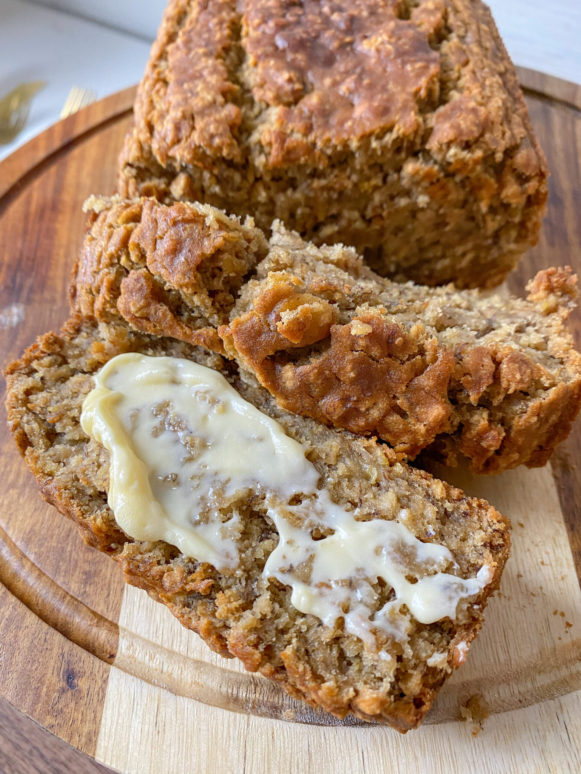 Slices of gluten free banana bread with butter.