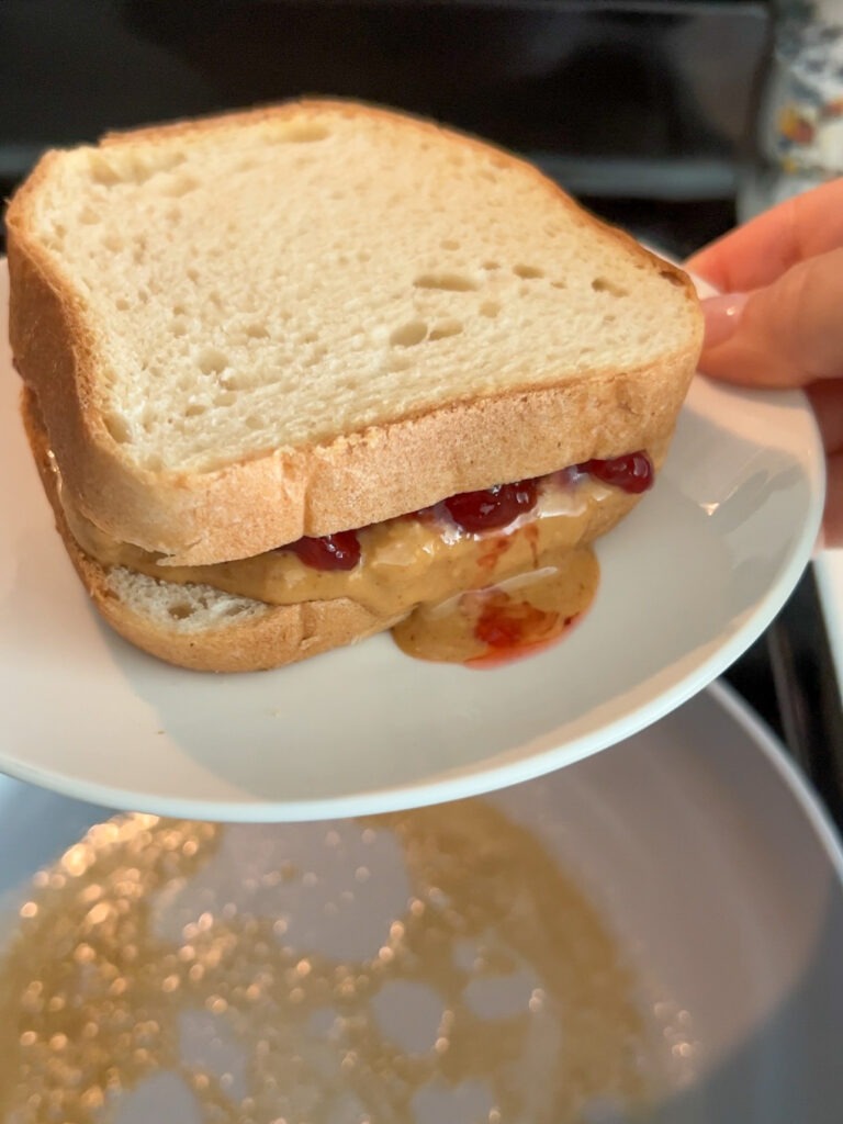 Golden and crisp on the outside, ooey gooey in the center. Take your peanut butter and jelly to the next level with this easy recipe. I bet you already have everything in your kitchen needed to make it!