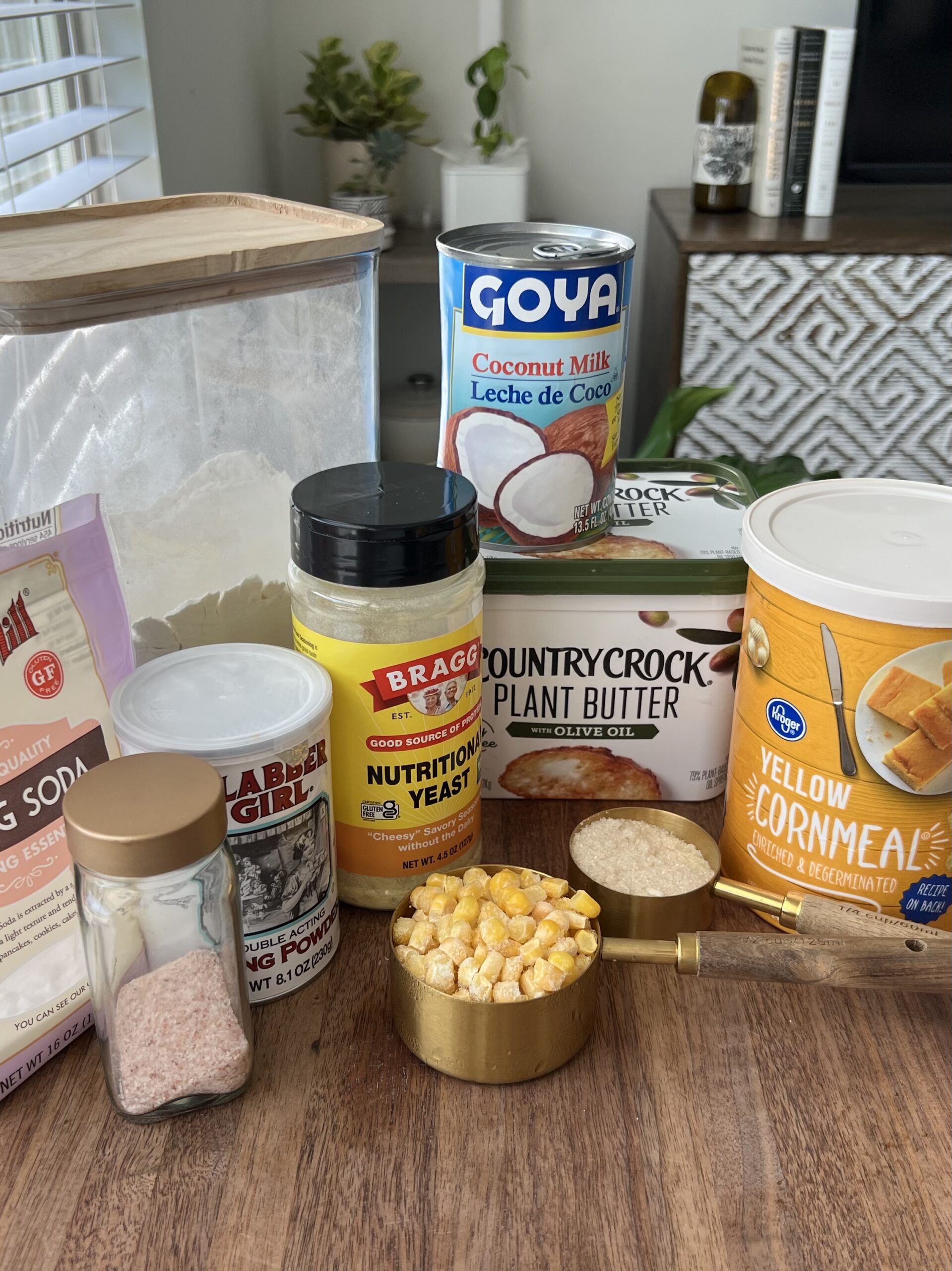 This homemade vegan cornbread can be made in one bowl and just poured into a 9x5-inch loaf pan. Hardly any mess to clean up! Photo shows the ingredients needed to make this moist vegan cornrbead.