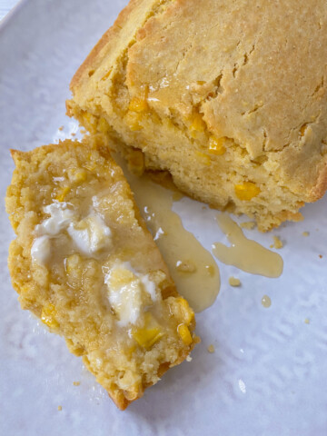Vegan Cornbread served with butter and honey.