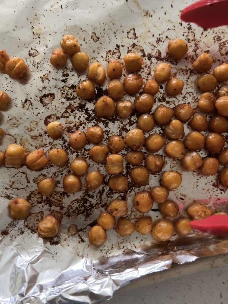 Chickpeas after being baked on the baking sheet. 
