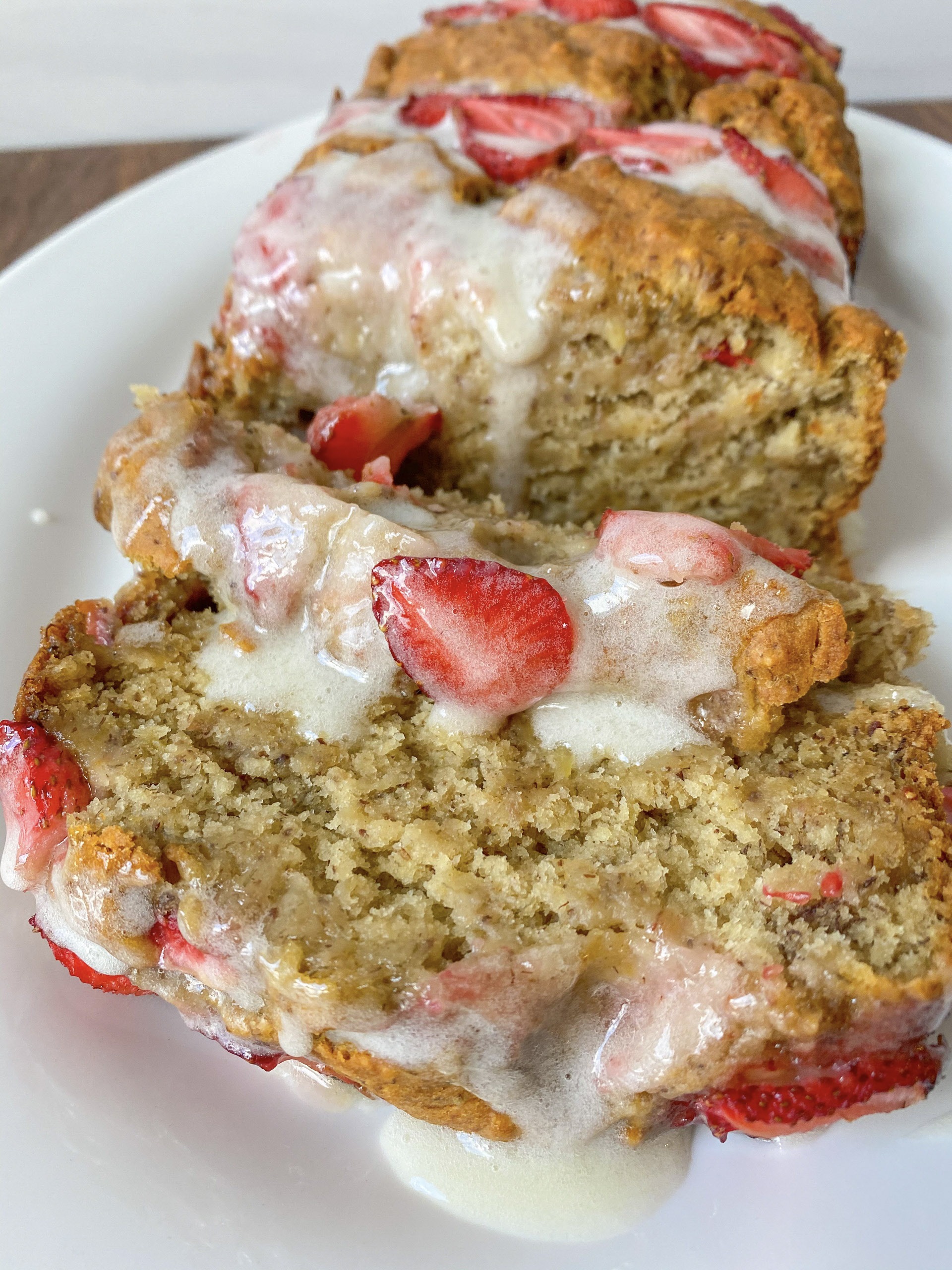 This Moist Vegan Strawberry Banana Bread is going to impress everyone in your home! Enjoy this tender, soft, and better-for-you bread for breakfast, a snack, or even dessert. You need a handful of ingredients that you probably already have in your kitchen. No one will guess this vegan strawberry banana bread is vegan and gluten-free friendly and everyone will love it!