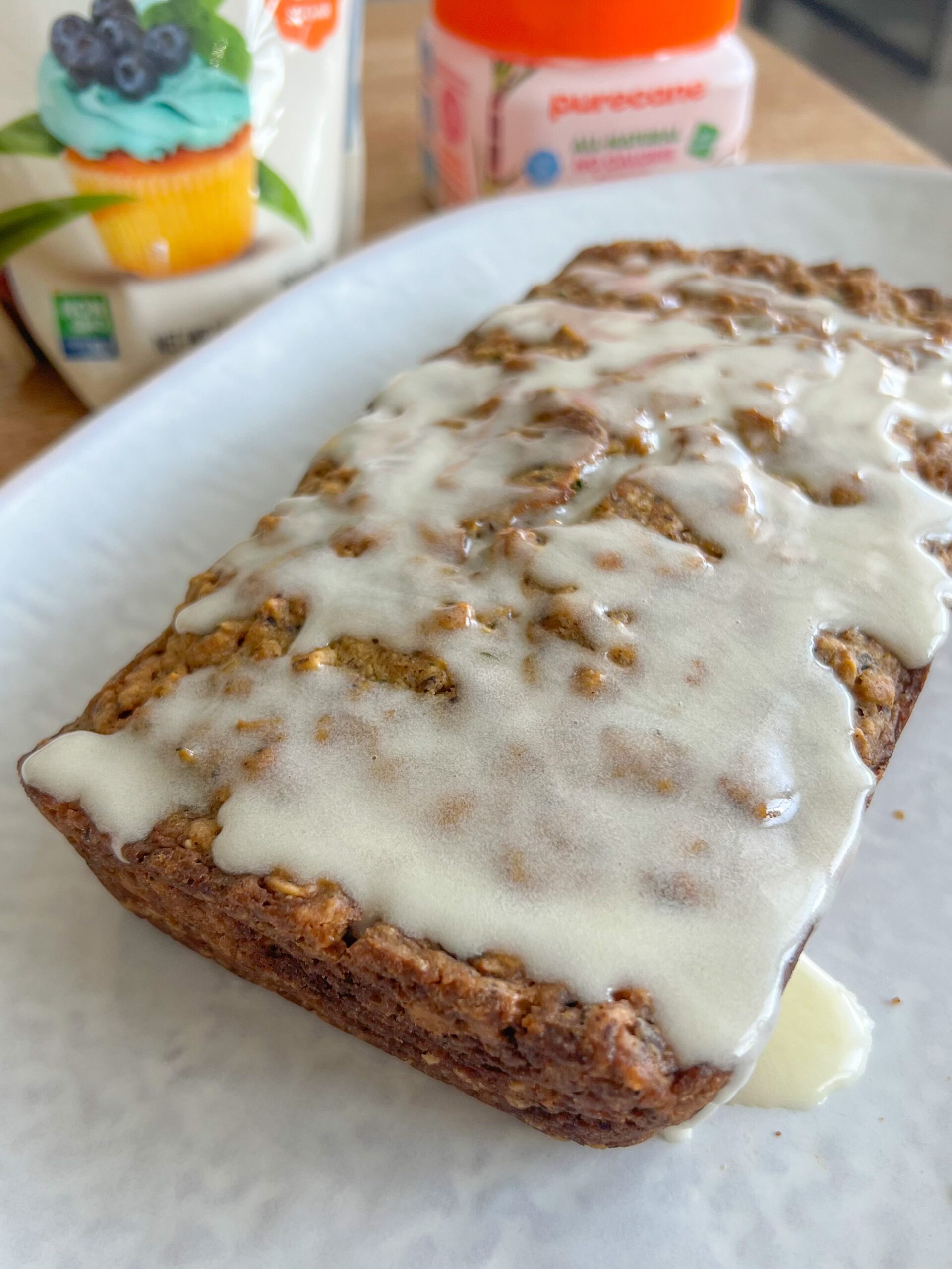 This easy and Healthy Zucchini Cake Recipe is the cross between a moist and delicious cake and a tasty zucchini bread. It's vegan and gluten-free friendly, deceptively healthy, and melt-in-your-mouth delicious!