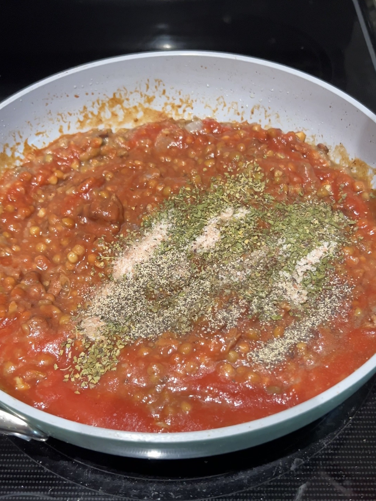 Step 3: Add the tomato sauce and spices, stir, and cook until the tomato sauce bubbles. Then, reduce the heat to a low simmer. Cook covered for 20 minutes.