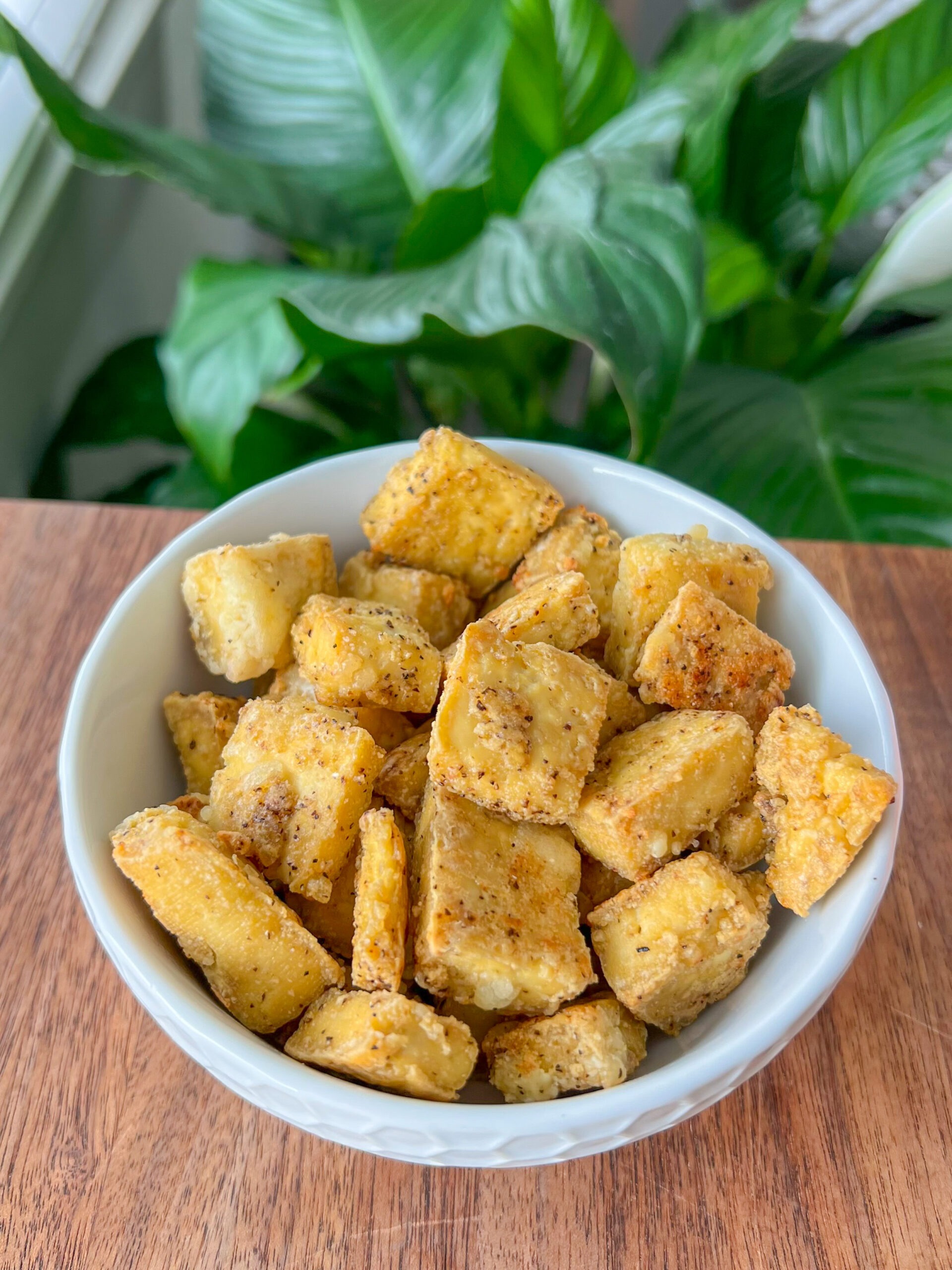 the easiest crispy tofu recipe, a bowl of crispy tofu