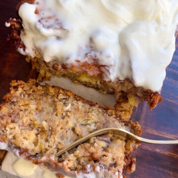 a fork slicing into the Cinnamon Roll Banana Bread