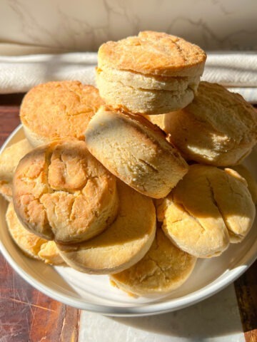 gluten-free biscuits stacked on a plate